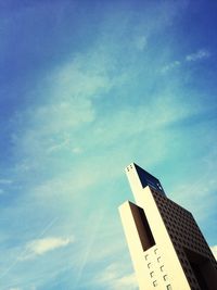 Low angle view of building against blue sky