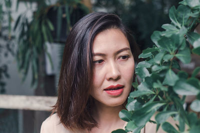 Close-up of woman looking away