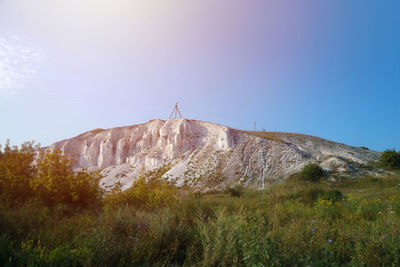 Low angle view of mountain against clear sky