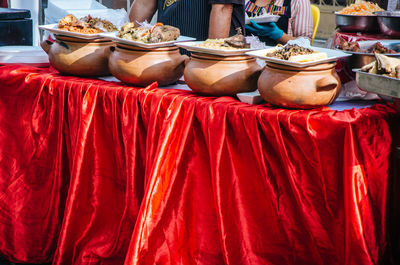 Close-up of red for sale at market stall