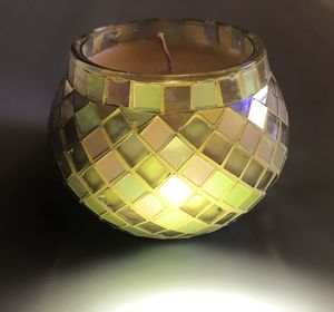 Close-up of illuminated lamp on table