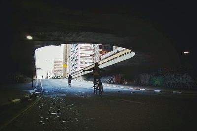 Person riding bicycle on road