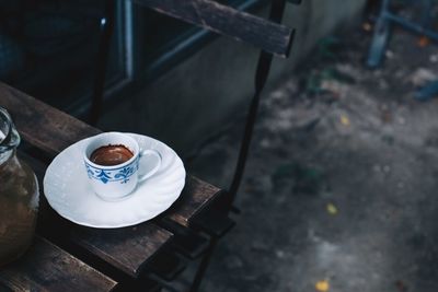 High angle view of coffee cup on table