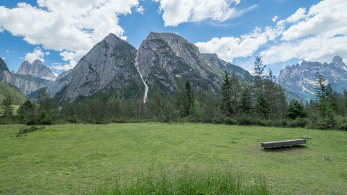 Scenic view of landscape and mountains against sky