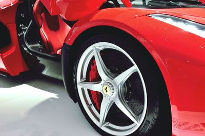 Close-up of vintage car parked on road