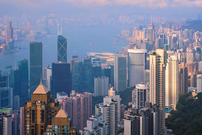 Modern buildings in city against sky