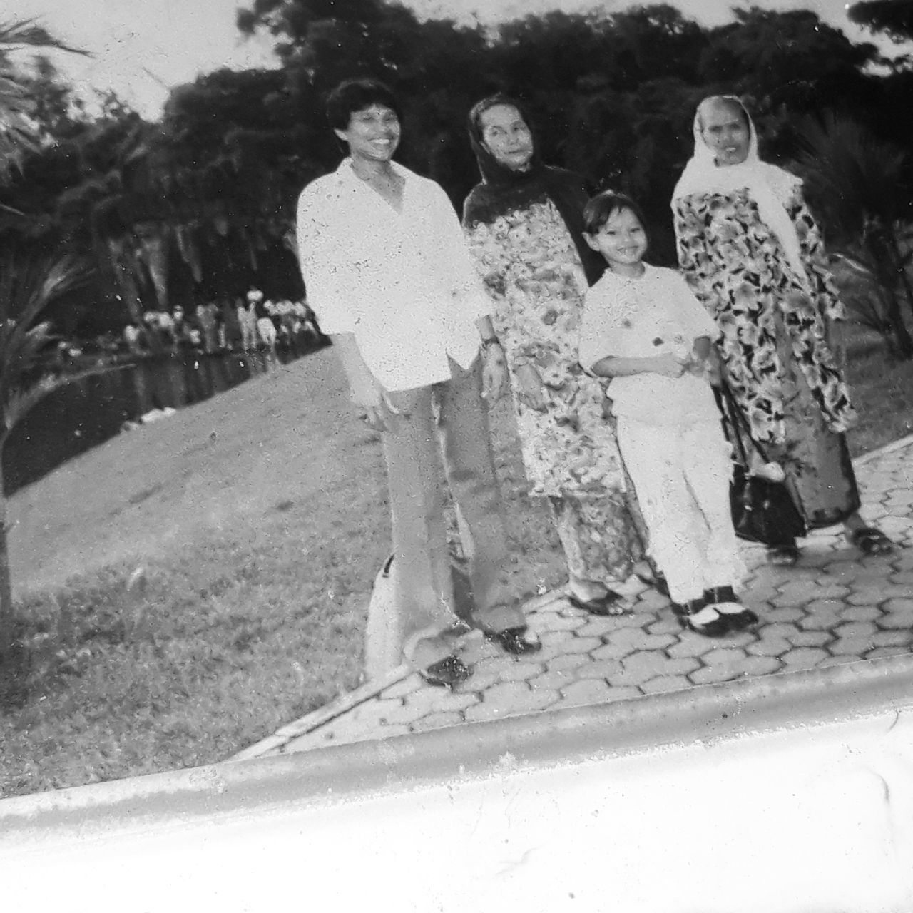 HIGH ANGLE VIEW OF GIRL STANDING BY PEOPLE