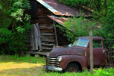 Abandoned vintage car on land