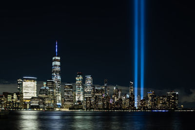 Illuminated buildings in city at night