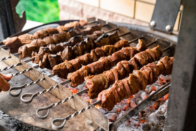 Close-up of meat on barbecue grill