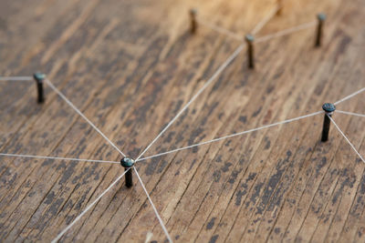 High angle view of umbrella on wood