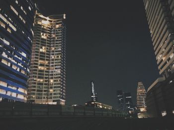 Low angle view of modern building at night