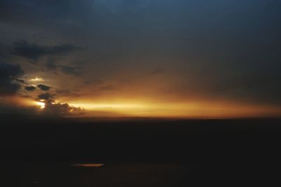 Scenic view of silhouette landscape against sky during sunset