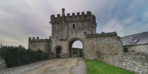 View of historic building against cloudy sky