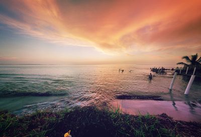 Scenic view of sea against sky during sunset