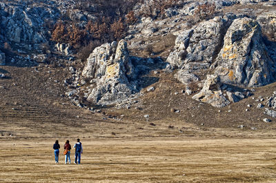 Group of people on rock