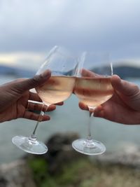 Cropped hand of woman holding wineglass