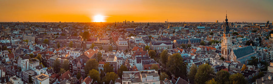 High angle view of townscape against sky during sunset