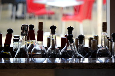 Glass bottles against window