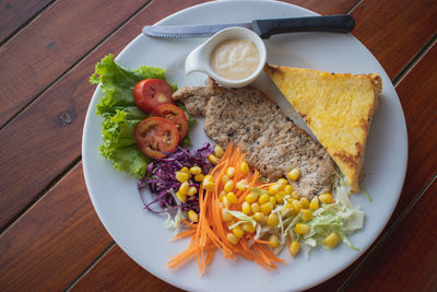 High angle view of breakfast served on table