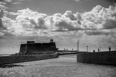 View of fort against cloudy sky