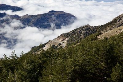 Low angle view of majestic mountains against sky