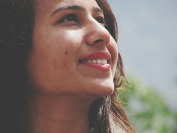 Close-up of smiling young woman