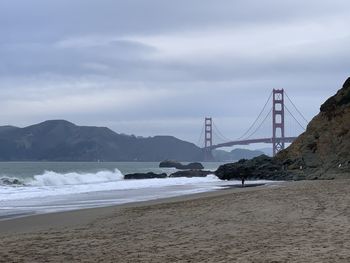 View of suspension bridge over sea