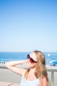 Portrait of young woman looking away