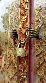 Close-up of padlock on door