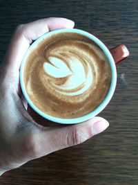 Directly above shot of cappuccino on table