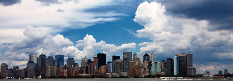 Panoramic shot of modern buildings against sky