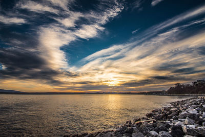 Scenic view of sea against sky during sunset