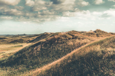 Scenic view of land against sky