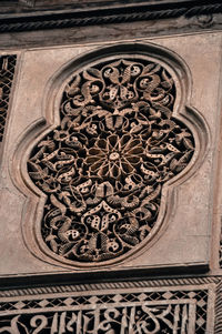 Low angle view of ornate carving on building