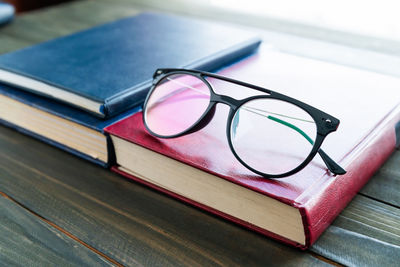 Close-up of eyeglasses on table