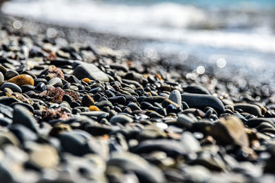 Close-up of stones on beach