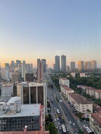 High angle view of buildings in city against sky