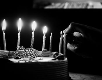 Burning candles in the dark