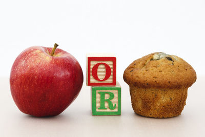 Close-up of apple against white background