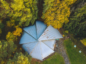 Directly above shot of built structure by trees during autumn