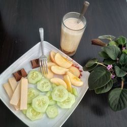 High angle view of fruits in glass on table