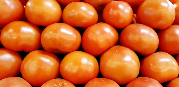 Full frame shot of oranges in market