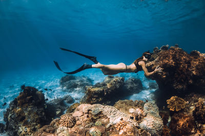 Man swimming in sea