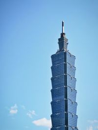 Low angle view of building against blue sky