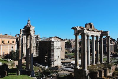 Low angle view of historic building against clear blue sky