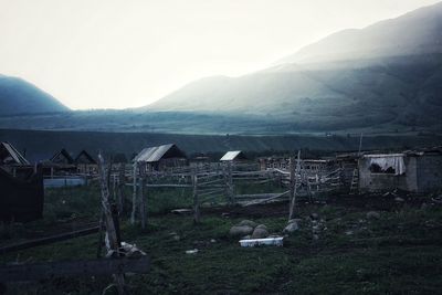 Scenic view of landscape and mountains against sky