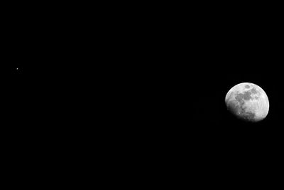 Moon over black background