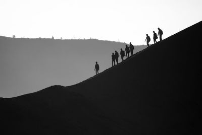 Silhouette landscape against clear sky