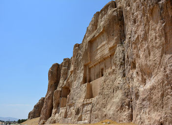 Low angle view of old ruin against sky